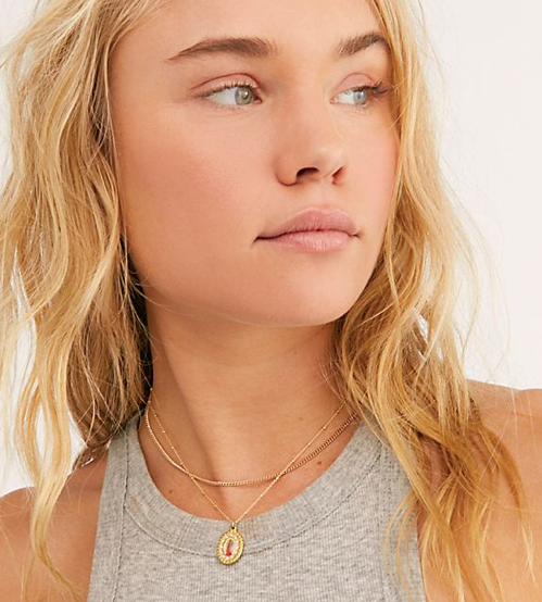Close-up styling of the La Mer pendant necklace