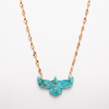 Solara Thunderbird Necklace in turquoise on a gold-filled chain