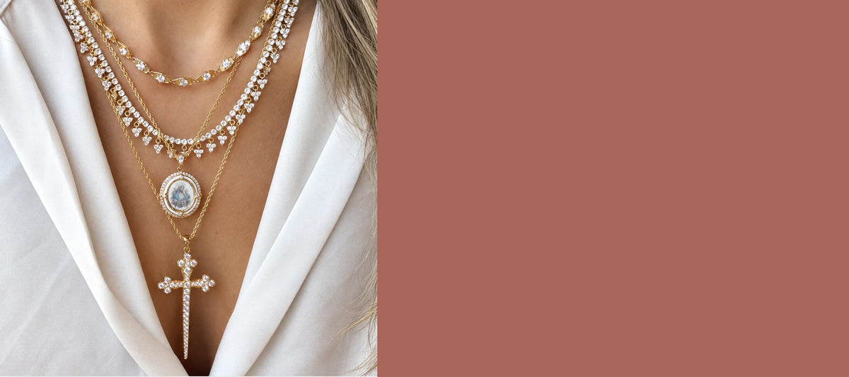 Joy wearing the Marie Rose and Athena CZ Cross in white - Holiday Pre-Order