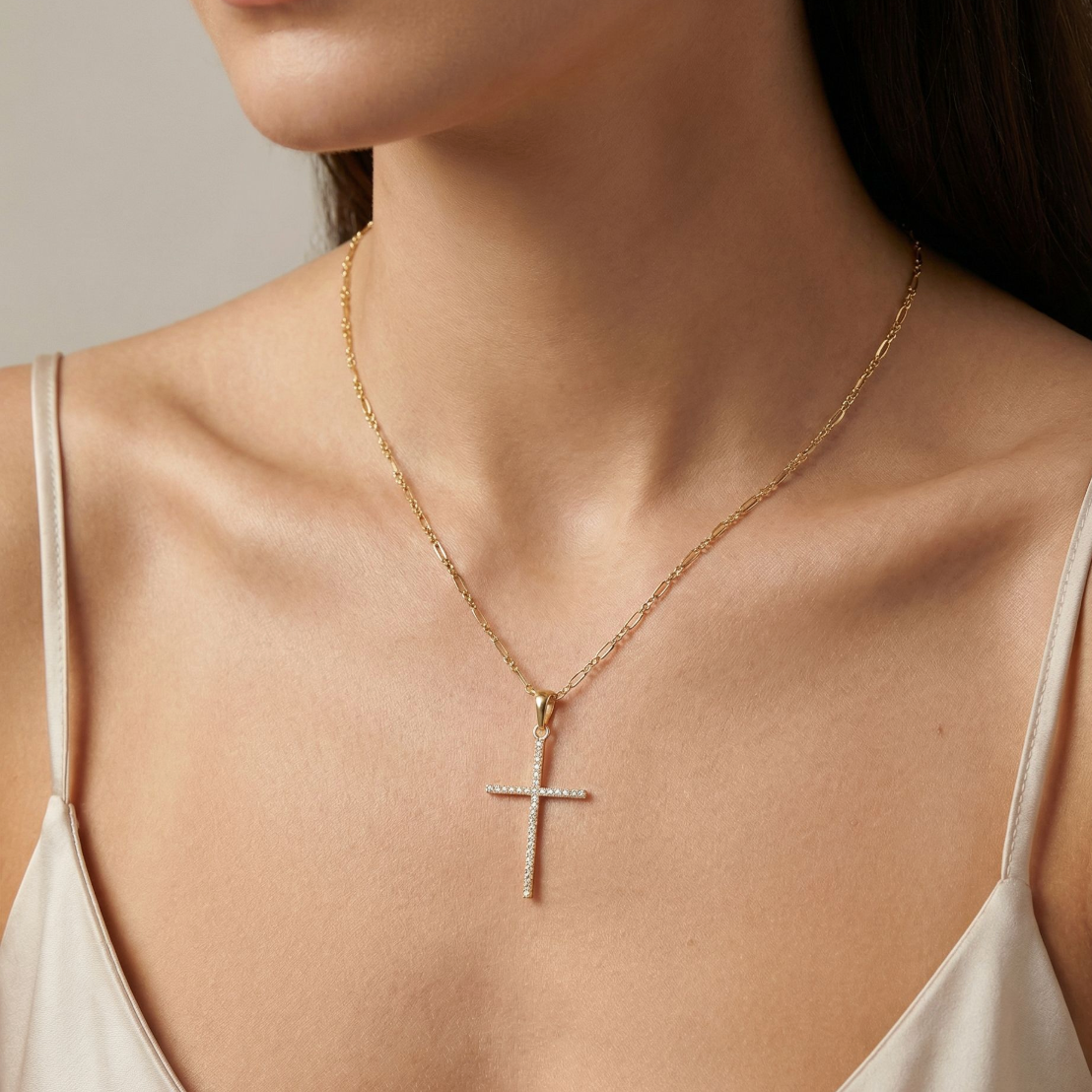 CZ Whisper Cross necklace styled with layered gold jewelry