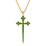 Athena Cross Necklace in Emerald CZ, a long gold cross with clover-shaped ends set with emerald-green cubic zirconia, on a gold chain
